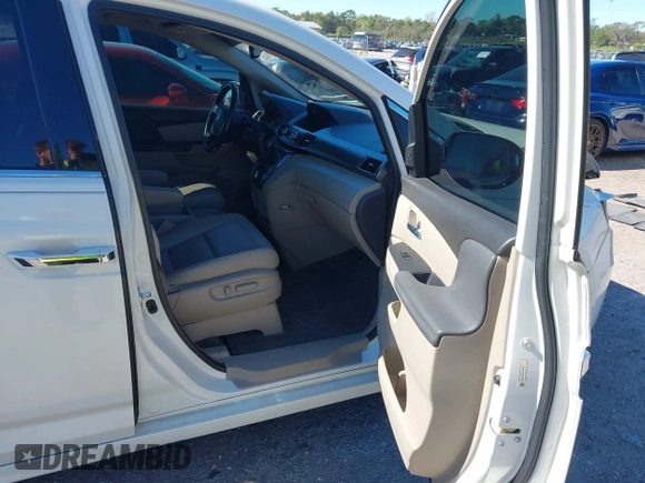 2015 Honda Odyssey Touring Elite with VIN 5FNRL5H96FB090702, listed as a IAAI auction lot 41825889 with 118,157 mi miles and . Bid and sale history available at DreamBid. Image 5.