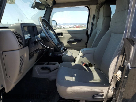2004 Jeep Wrangler Sahara with VIN 1J4FA59SX4P718591, listed as a Copart auction lot 59907805 with 241,994 mi miles and Clean title. Bid and sale history available at DreamBid. Image 7.