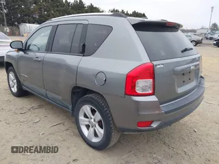 2011 Jeep Compass with VIN 1J4NT1FA2BD241485, listed as a IAAI auction lot 41496076 with 134,825 mi miles. Bid and sale history available at carsss.com. Image 3.