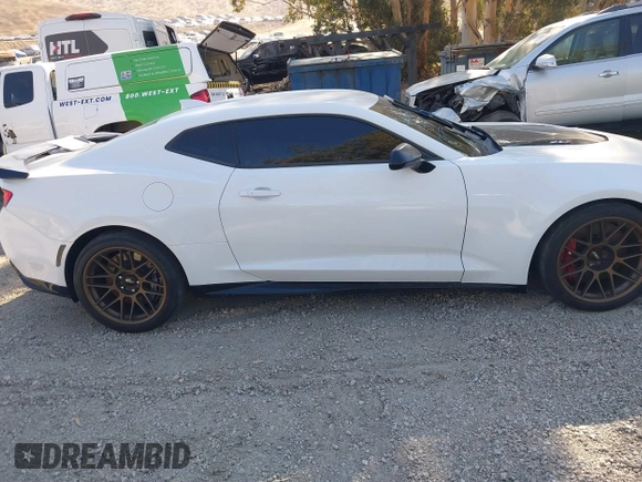 2018 Chevrolet Camaro ZL1 with VIN 1G1FK1R69J0105146, listed as a IAAI auction lot 40570089 with 34,804 mi miles and . Bid and sale history available at DreamBid. Image 13.