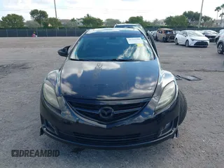 2009 Mazda 6 S Grand Touring with VIN 1YVHP82BX95M21939, listed as a IAAI auction lot 41527269 with 154,544 mi miles and . Bid and sale history available at DreamBid. Image 13.