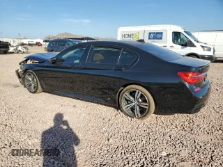 2018 BMW 7 Series 750i with VIN WBA7F0C57JGM23040, listed as a Copart auction lot 87392704 with 0 mi miles and Salvage Title. Bid and sale history available at carsss.com. Image 2.