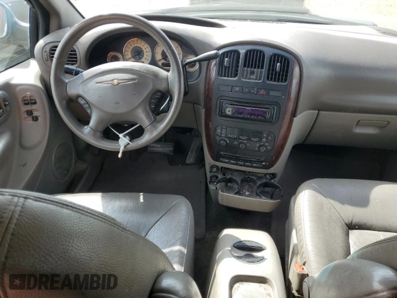 2001 Chrysler Town & Country LXi with VIN 2C4GP54L11R176042, listed as a Copart auction lot 69045254 with 217,421 mi miles and Salvage Title. Bid and sale history available at DreamBid. Image 8.