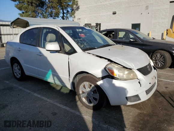 2011 Suzuki SX4 LE with VIN JS2YC5A21B6300207, listed as a Copart auction lot 77040354 with 162,915 mi miles and Salvage Title. Bid and sale history available at carsss.com. Image 4.
