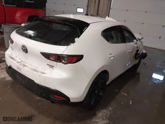 2021 Mazda Mazda3 Hatchback 2.5 Turbo with VIN JM1BPBJY0M1347526, listed as a IAAI auction lot 41519847 with 77,854 mi miles. Bid and sale history available at carsss.com. Image 4.