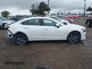 2021 Mazda 6 Touring with VIN JM1GL1VM7M1611070, listed as a IAAI auction lot 41755673 with 46,288 mi miles and . Bid and sale history available at carsss.com. Image 13.