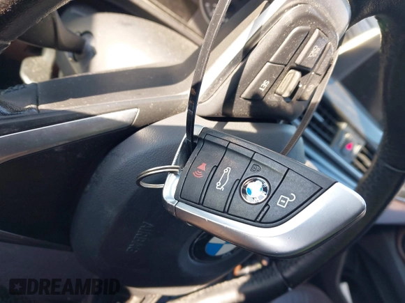 2017 BMW X1 xDrive28i with VIN WBXHT3Z36H4A52364, listed as a IAAI auction lot 41397667 with 61,960 mi miles. Bid and sale history available at carsss.com. Image 11.