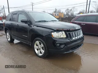 2012 Jeep Compass Sport with VIN 1C4NJDBB9CD658843, listed as a IAAI auction lot 41936099 with 216,780 mi miles. Bid and sale history available at carsss.com. Image 1.