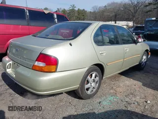 1998 Nissan Altima XE with VIN 1N4DL01D9WC223547, listed as a IAAI auction lot 41275743 with 178,699 mi miles. Bid and sale history available at carsss.com. Image 4.