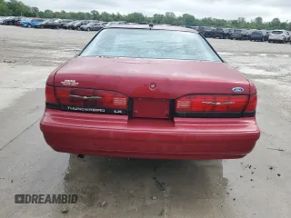 1993 Ford Thunderbird z VIN 1FAPP624XPH165181, wystawiony jako Copart lot #56587485 z przebiegiem 78 273 mil mil oraz Szkoda całkowita • Salvage title. Historia ofert i sprzedaży dostępna na DreamBid. Obrazek 6.