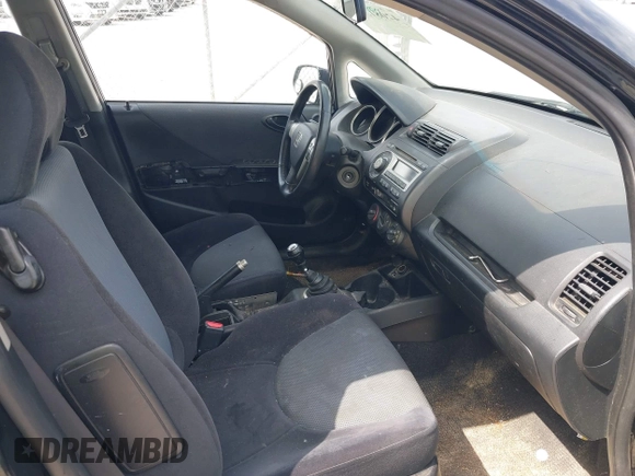 2007 Honda Fit Sport with VIN JHMGD37627S051981, listed as a IAAI auction lot 42081339 with 243,703 mi miles and . Bid and sale history available at DreamBid. Image 5.