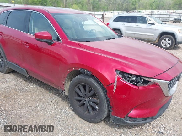 2016 Mazda CX-9 Touring z VIN JM3TCACY0G0101617, wystawiony jako IAAI lot #41850485 z przebiegiem 292 880 mil mil oraz . Historia ofert i sprzedaży dostępna na DreamBid. Obrazek 6.