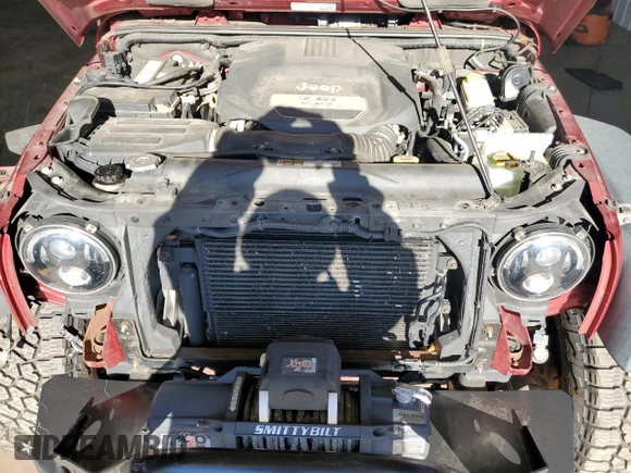 2013 Jeep Wrangler Unlimited Rubicon 10th Anniversary z VIN 1C4HJWFG2DL572943, wystawiony jako Copart lot #80610363 z przebiegiem 88 296 mil mil oraz Szkoda całkowita • Salvage title. Historia ofert i sprzedaży dostępna na DreamBid. Obrazek 12.