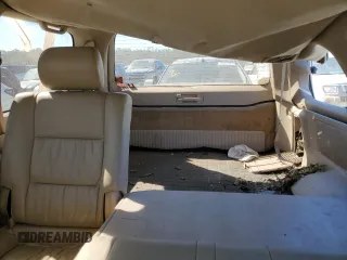 2002 Toyota Land Cruiser with VIN JTEHT05J122027769, listed as a Copart auction lot 76518004 with 151,767 mi miles and Salvage Title. Bid and sale history available at carsss.com. Image 10.