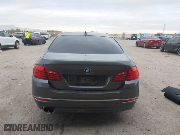 2014 BMW 5 Series 535d with VIN WBAXA5C58ED689864, listed as a IAAI auction lot 40983130 with 139,104 mi miles and . Bid and sale history available at carsss.com. Image 16.