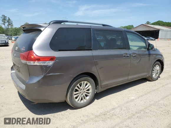 2014 Toyota Sienna XLE with VIN 5TDYK3DC6ES473747, listed as a Copart auction lot 53828345 with 251,390 mi miles and Clean Title. Bid and sale history available at carsss.com. Image 3.