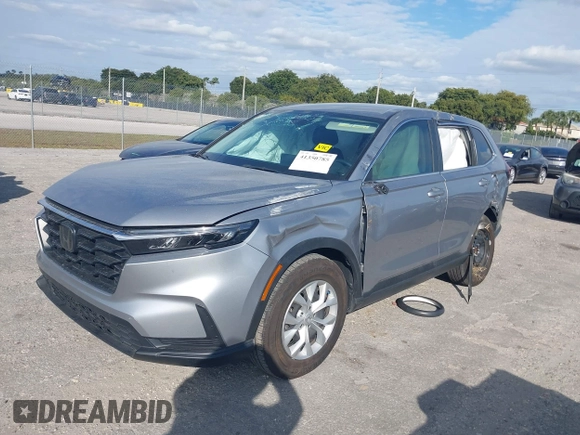 2024 Honda CR-V LX with VIN 2HKRS3H21RH308688, listed as a IAAI auction lot 41350785 with 19,835 mi miles and . Bid and sale history available at DreamBid. Image 2.