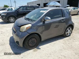 2012 Scion iQ with VIN JTNJJXB06CJ011117, listed as a Copart auction lot 52694345 with 94,547 mi miles and Salvage Title. Bid and sale history available at carsss.com. Image 1.