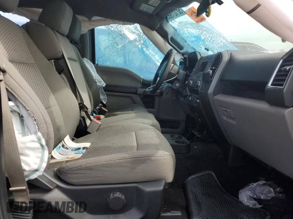 2016 Ford F-150 XLT with VIN 1FTEW1EF4GKE98094, listed as a Copart auction lot 52121985 with 125,000 mi miles and Salvage Title. Bid and sale history available at DreamBid. Image 7.