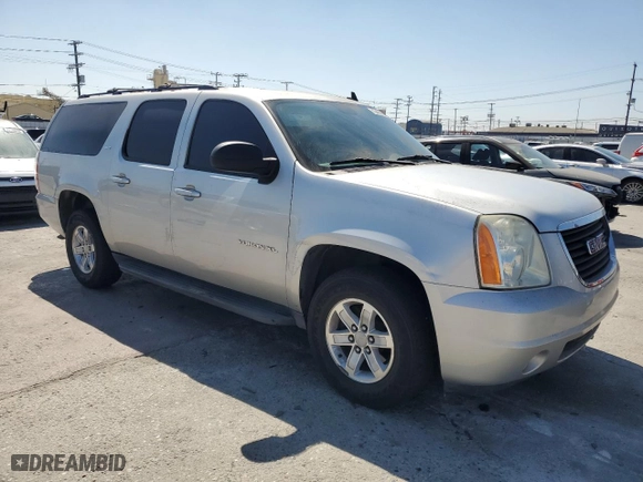 2011 GMC Yukon XL SLT with VIN 1GKS1KE04BR322220, listed as a Copart auction lot 73423994 with 165,506 mi miles and Salvage Title. Bid and sale history available at carsss.com. Image 4.