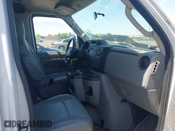 2014 Ford Econoline Cargo Commercial with VIN 1FTNE1EW9EDA17227, listed as a IAAI auction lot 40119708 with 231,292 mi miles and . Bid and sale history available at DreamBid. Image 5.