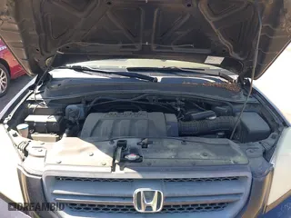 2005 Honda Pilot EX-L with RES with VIN 5FNYF18665B023730, listed as a IAAI auction lot 41989012 with 202,022 mi miles. Bid and sale history available at carsss.com. Image 10.
