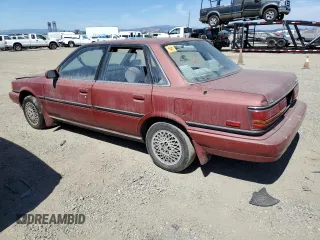1990 Toyota Camry LE ECT z VIN JT2SV22E0L0351440, wystawiony jako Copart lot #70768614 z przebiegiem 176 239 mil mil oraz Szkoda całkowita • Salvage title. Historia ofert i sprzedaży dostępna na DreamBid. Obrazek 2.