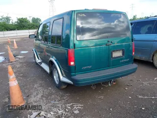 1999 Chevrolet Astro Cargo YF7 z VIN 1GBDM19W7XB184567, wystawiony jako IAAI lot #42422713 z przebiegiem 235 859 mil mil oraz . Historia ofert i sprzedaży dostępna na DreamBid. Obrazek 3.