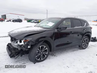 2023 Mazda CX-5 2.5 S Premium Plus Package with VIN JM3KFBEM6P0172890, listed as a IAAI auction lot 41312358 with 19,574 mi miles. Bid and sale history available at carsss.com. Image 2.