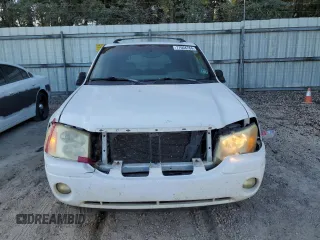 2002 GMC Envoy SLT with VIN 1GKDS13S822460095, listed as a Copart auction lot 77004764 with 267,716 mi miles and Salvage Title. Bid and sale history available at carsss.com. Image 5.