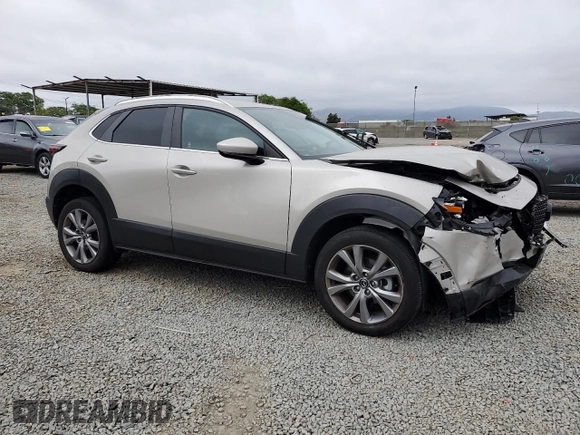 2023 Mazda CX-30 S Preferred with VIN 3MVDMBCM1PM562348, listed as a Copart auction lot 59383805 with 11,858 mi miles and Salvage title. Bid and sale history available at DreamBid. Image 4.
