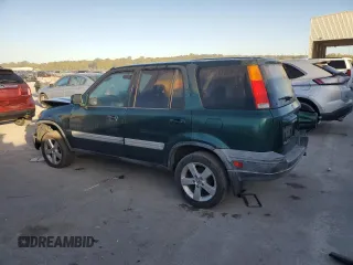 2000 Honda CR-V EX with VIN JHLRD1863YC017768, listed as a Copart auction lot 76383504 with 223,753 mi miles and Salvage Title. Bid and sale history available at carsss.com. Image 2.