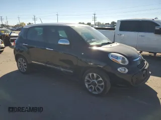 2014 FIAT 500L Lounge with VIN ZFBCFACHXEZ012262, listed as a Copart auction lot 76758574 with 135,218 mi miles and Salvage Title. Bid and sale history available at carsss.com. Image 4.
