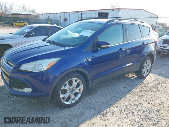 2013 Ford Escape SEL with VIN 1FMCU9HX5DUB24167, listed as a IAAI auction lot 41789266 with 130,608 mi miles. Bid and sale history available at carsss.com. Image 2.