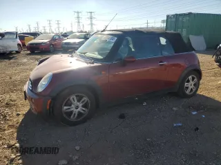2007 MINI Convertible with VIN WMWRF33557TG17353, listed as a Copart auction lot 78946104 with 98,362 mi miles and Salvage Title. Bid and sale history available at DreamBid. Image 1.