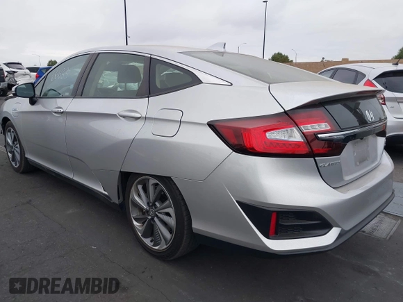 2018 Honda Clarity Touring with VIN JHMZC5F32JC014588, listed as a IAAI auction lot 42066633 with 89,316 mi miles. Bid and sale history available at carsss.com. Image 3.