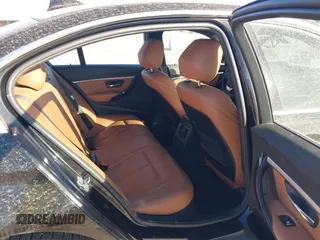 2017 BMW 3 Series 330e iPerformance with VIN WBA8E1C34HA156688, listed as a IAAI auction lot 41753490 with 74,130 mi miles. Bid and sale history available at carsss.com. Image 8.
