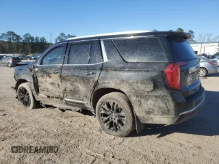 2023 GMC Yukon SLT with VIN 1GKS2BKD5PR209033, listed as a Copart auction lot 87643285 with 61,190 mi miles and Salvage Title. Bid and sale history available at carsss.com. Image 2.