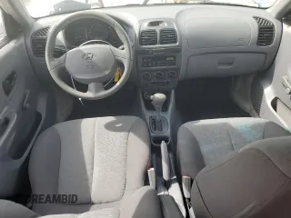 2004 Hyundai Accent GL with VIN KMHCG45C64U524377, listed as a Copart auction lot 53976094 with 65,230 mi miles and Non Repairable. Bid and sale history available at carsss.com. Image 8.