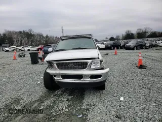 1997 Ford Expedition XLT with VIN 1FMEU17L5VLB80125, listed as a Copart auction lot 83892824 with 257,738 mi miles and Salvage title. Bid and sale history available at DreamBid. Image 11.