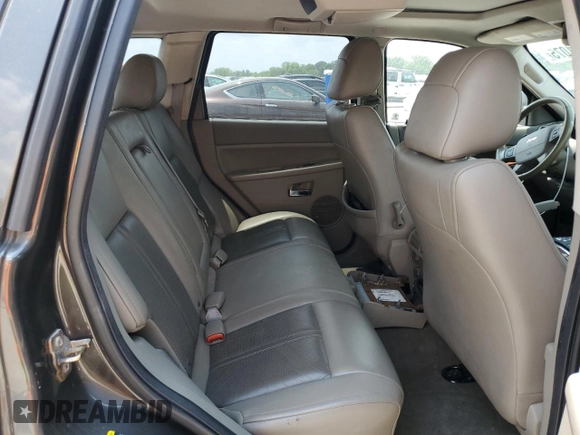 2005 Jeep Grand Cherokee Limited z VIN 1J8HR58245C680060, wystawiony jako Copart lot #59271075 z przebiegiem 263 384 mil mil oraz Czysty tytuł • Clean title. Historia ofert i sprzedaży dostępna na DreamBid. Obrazek 11.