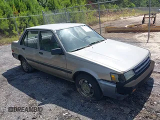 1987 Toyota Corolla with VIN JT2AE82E6H3501099, listed as a IAAI auction lot 42784065 with 178,181 mi miles and . Bid and sale history available at DreamBid. Image 1.