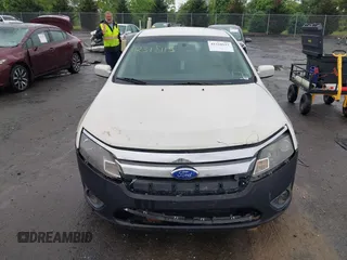 2012 Ford Fusion SE z VIN 3FAHP0HA4CR261668, wystawiony jako IAAI lot #42318115 z przebiegiem 81 923 mil mil oraz . Historia ofert i sprzedaży dostępna na DreamBid. Obrazek 12.