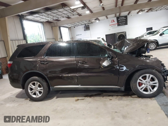2013 Dodge Durango SXT with VIN 1C4RDJAG3DC540038, listed as a IAAI auction lot 42366965 with Not provided miles and . Bid and sale history available at DreamBid. Image 13.