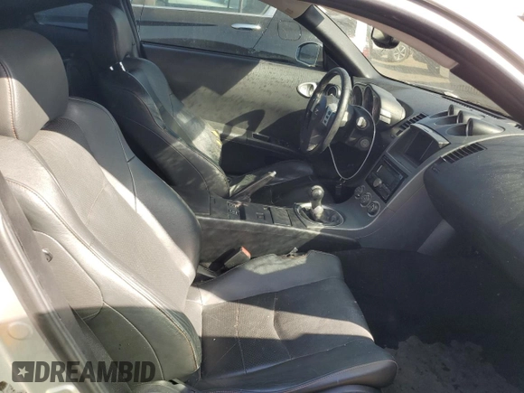 2003 Nissan 350Z Touring z VIN JN1AZ34E73T016672, wystawiony jako Copart lot #52968375 z przebiegiem 125 844 mil mil oraz Szkoda całkowita • Salvage title. Historia ofert i sprzedaży dostępna na DreamBid. Obrazek 10.
