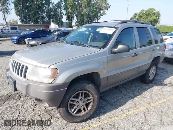 2004 Jeep Grand Cherokee Laredo with VIN 1J4GX48N24C334983, listed as a IAAI auction lot 42522088 with 169,793 mi miles and . Bid and sale history available at DreamBid. Image 2.