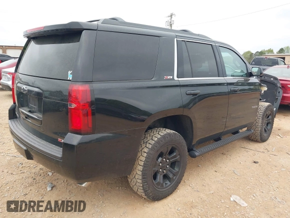 2017 Chevrolet Tahoe LT with VIN 1GNSKBKCXHR388181, listed as a IAAI auction lot 41936609 with 94,783 mi miles and . Bid and sale history available at DreamBid. Image 4.