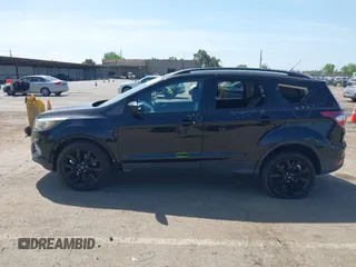 2017 Ford Escape SE with VIN 1FMCU0G9XHUE37185, listed as a IAAI auction lot 42053979 with 72,904 mi miles. Bid and sale history available at carsss.com. Image 14.