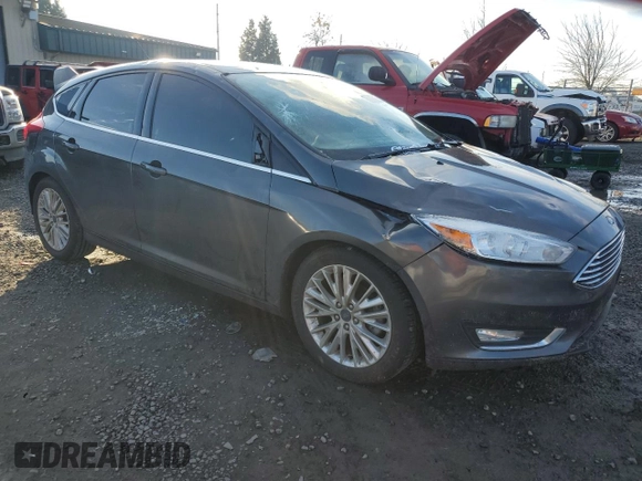 2017 Ford Focus Titanium with VIN 1FADP3N24HL287982, listed as a Copart auction lot 88100515 with 103,615 mi miles and Salvage Title. Bid and sale history available at carsss.com. Image 4.