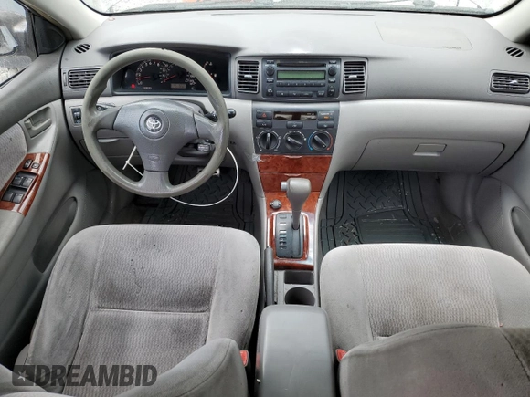 2005 Toyota Corolla CE with VIN 1NXBR32EX5Z407487, listed as a Copart auction lot 61650235 with 233,561 mi miles and Salvage title. Bid and sale history available at DreamBid. Image 8.